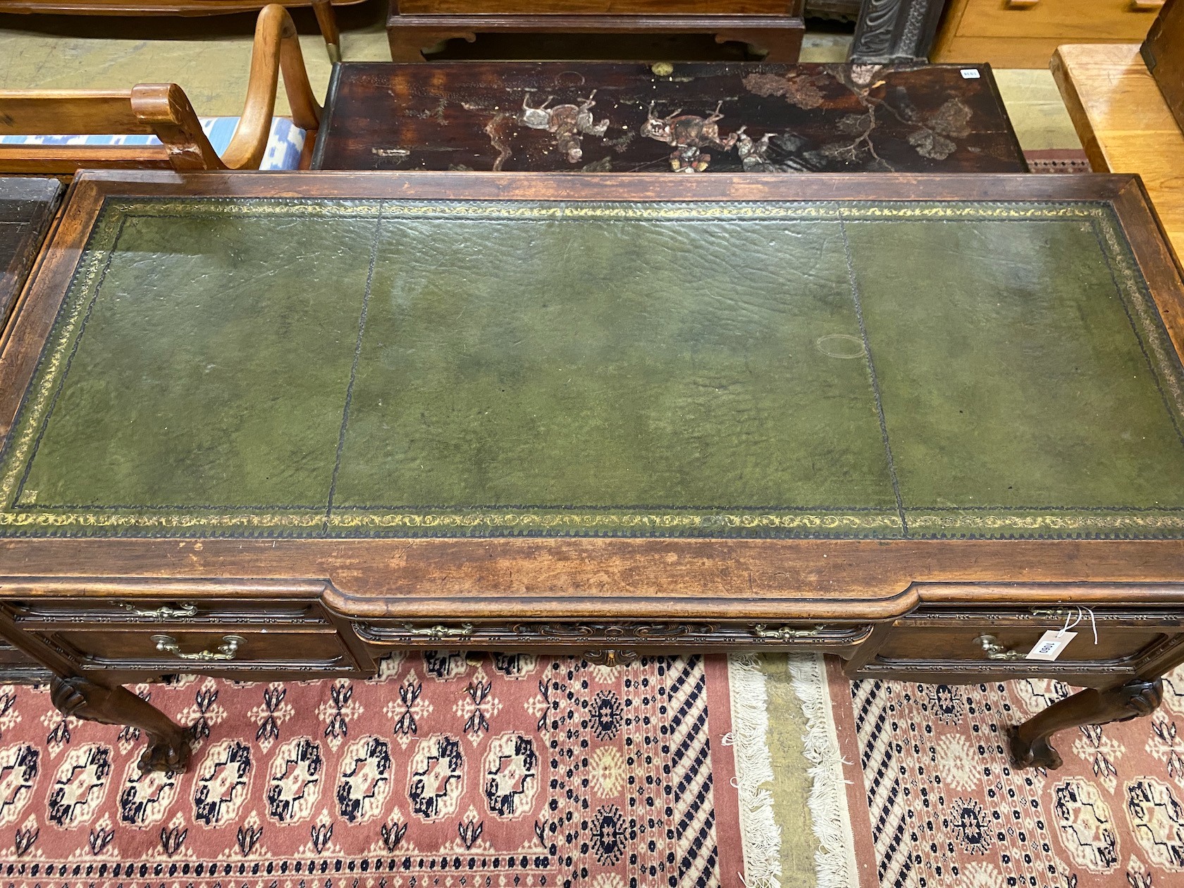 A George II style mahogany breakfront kneehole desk, width 152cm, depth 68cm, height 75cm